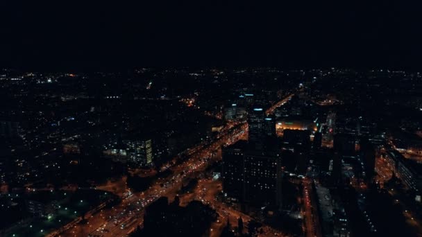 Night aerial shot of busy city traffic life — Stock Video