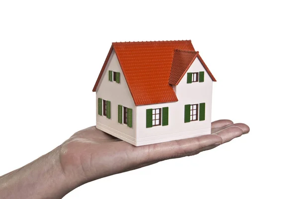 House is carried on a hand — Stock Photo, Image