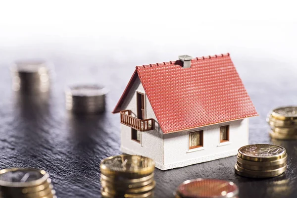 House and coins — Stock Photo, Image