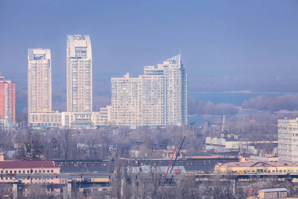 Early spring at sunny evening in warm weather. Industrial zone a — Stock Photo, Image