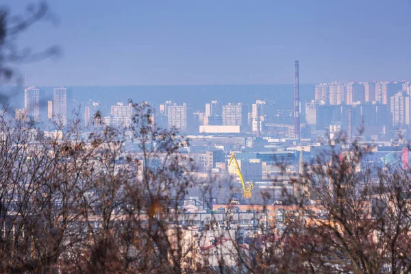 Early spring at sunny evening in warm weather. Industrial zone a — Stock Photo, Image