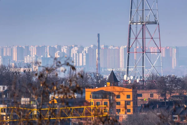 Early spring at sunny evening in warm weather. Industrial zone a — Stock Photo, Image