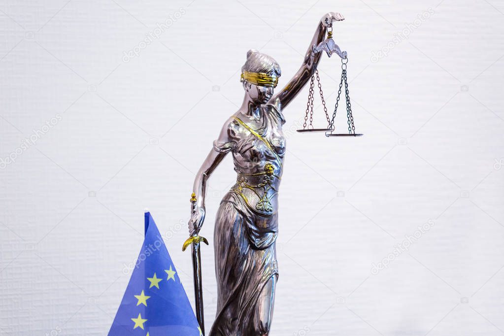 Statuette Of Justice Themis Ancient Greek Goddess Of Divine Law Justice Eu Flag Is On The Table Is Next 263650158 Larastock