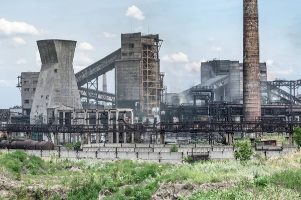 The largest air pollutant in city Dnipro Ukraine is coke-chemical plant. Flue gas stacks emit hundreds tons of harmful substances a years into the atmosphere. Industrial landscape.