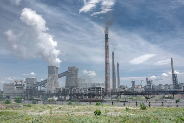 The largest air pollutant in city Dnipro Ukraine is coke-chemical plant. Flue gas stacks emit hundreds tons of harmful substances a years into the atmosphere. Industrial landscape.