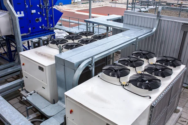 External infrastructure of the microclimate support system at a large industrial site. Air pipelines inlet and exhaust. Fans and air conditioning. Systems of control of pressure, humidity, temperature