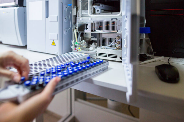 The laboratory scientist prepares samples for download to High-performance Liquid Chromatograph Mass Spectrometr.