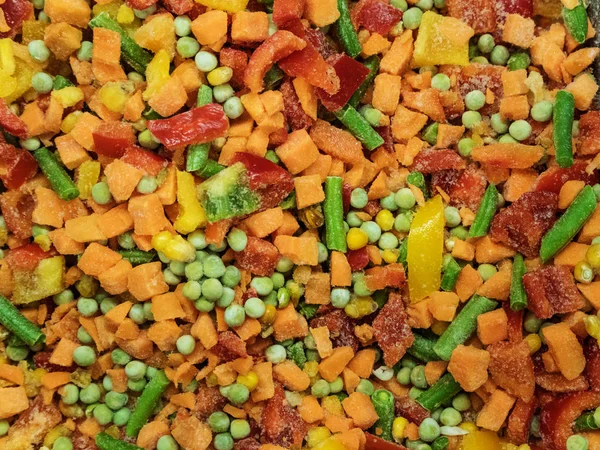 Frozen vegetable mix in a fridge in the store