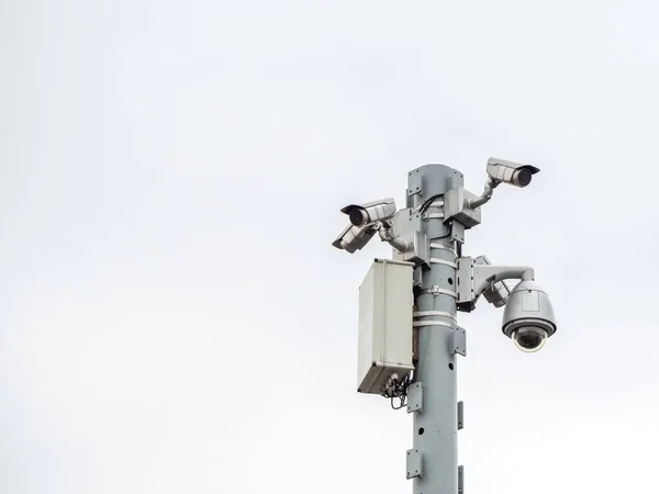 Closeup photo of a column with many surveillance cameras — Stock Photo, Image