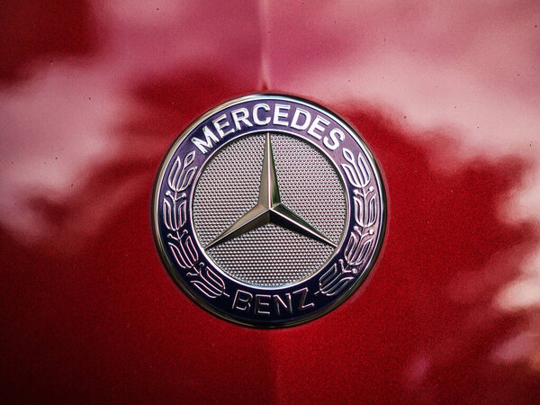 Russia, Sochi 07.23.2019. Mercedes benz sign on a red hood