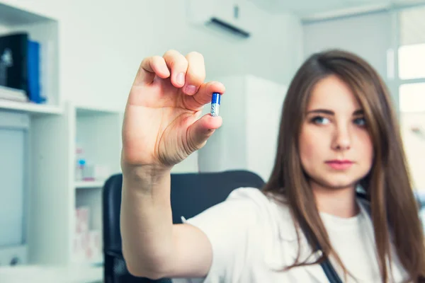 Serious Female Doctor White Coat Stethoscope Holding Pill Her Fingers — Stock Photo, Image