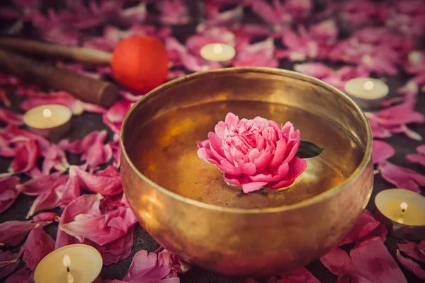 Tibetan Singing Bowl Floating Water Pink Peony Flower Burning Candles — Stock Photo, Image