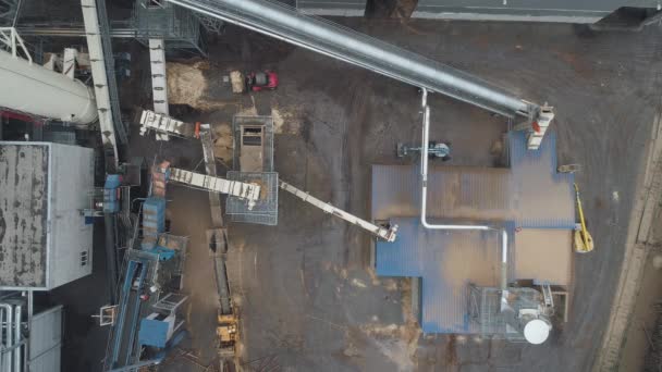 Woodworking factory aerial view of pipes and tanks, industrial landscape, conveyor and production line view, chipboard manufacturer. — Stock Video