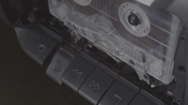 Old Audio cassette playing tape recorder reels rotating retro music concept — Stock Video