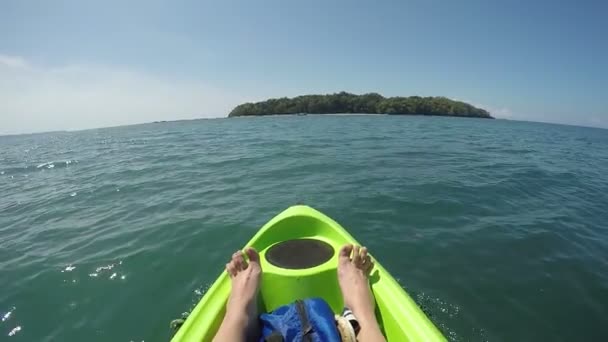 Female feet relaxing on kayak in pacific ocean point of view pov, inspirational landscape, active adventure travel — Stock Video