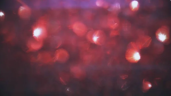 Bokeh lights sparkle, abstract shining background red texture, colorful and bright, happy, love — Stock Photo, Image