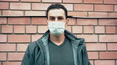 man in mask angy show fuck off to corona virus, protection protest