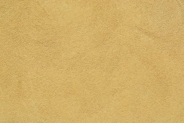 Sarı kahverengi alçı duvar arka plan olarak