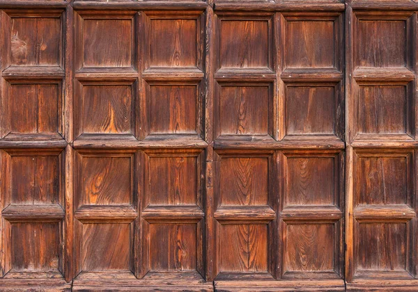 Old wooden portal with squares as background