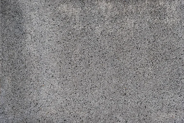 Сірий бетон з гравійним фоном стін — стокове фото