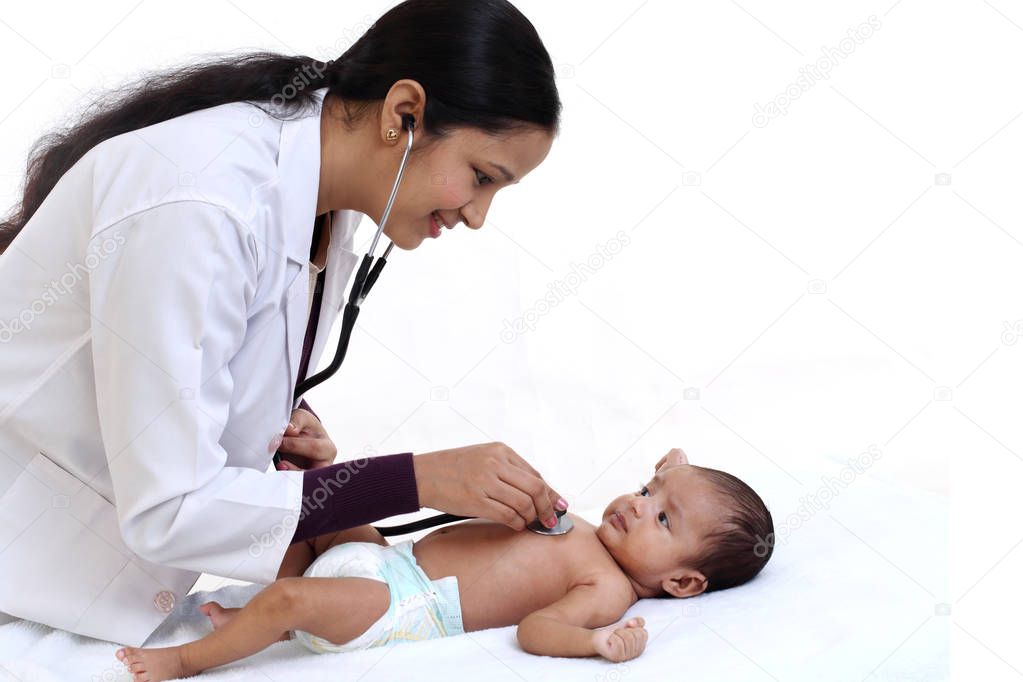 Female pediatrician examine newborn baby