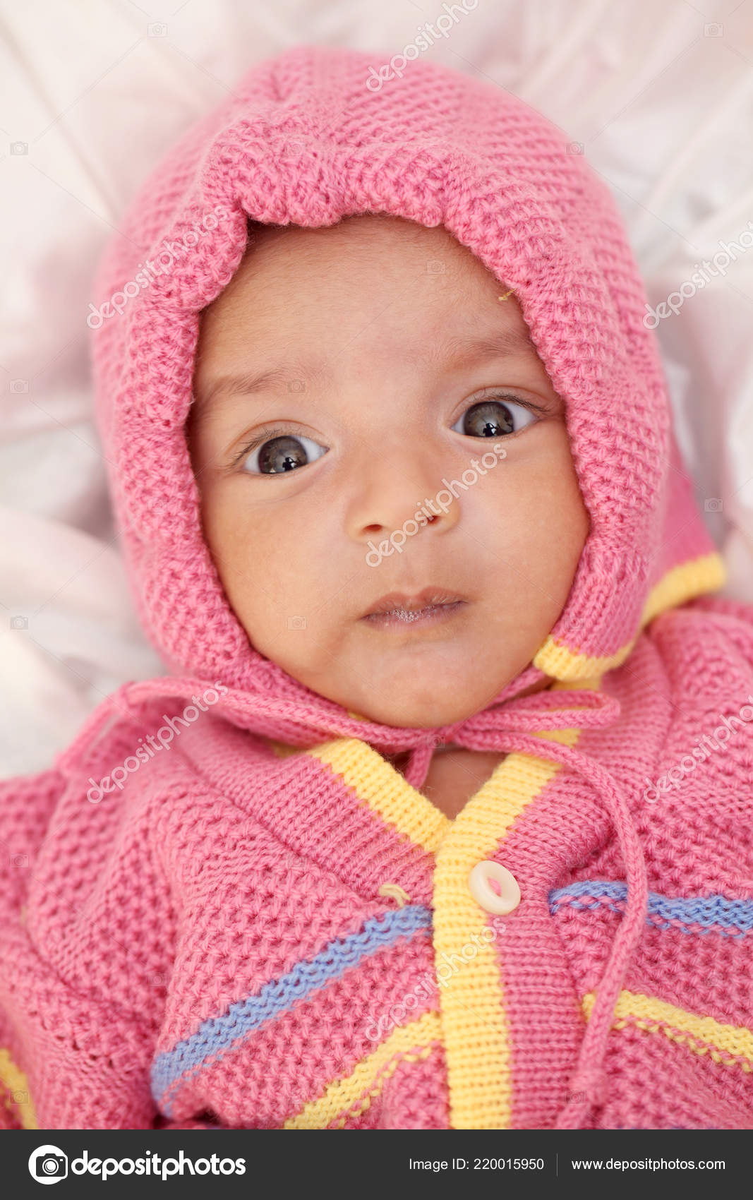 baby wearing sweater