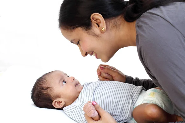 Cheerful Young Mother Playing Newborn Baby — Stock Photo, Image