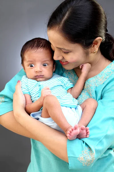 Cheerful Young Mother Playing Newborn Baby — Stock Photo, Image