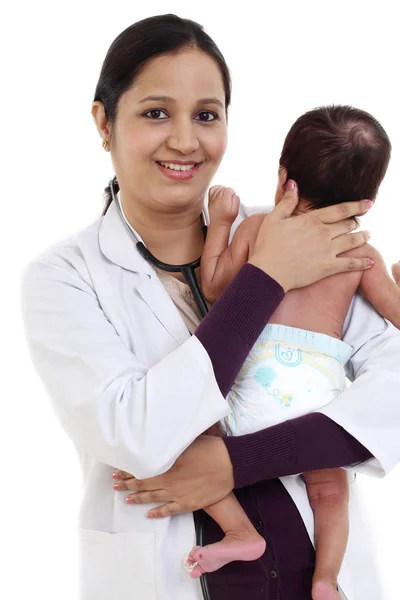 Cheerful Female Pediatrician Holds Newborn Baby Stock Photo