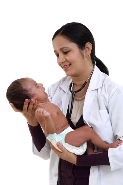 Cheerful Female Pediatrician Holds Newborn Baby Royalty Free Stock Photos