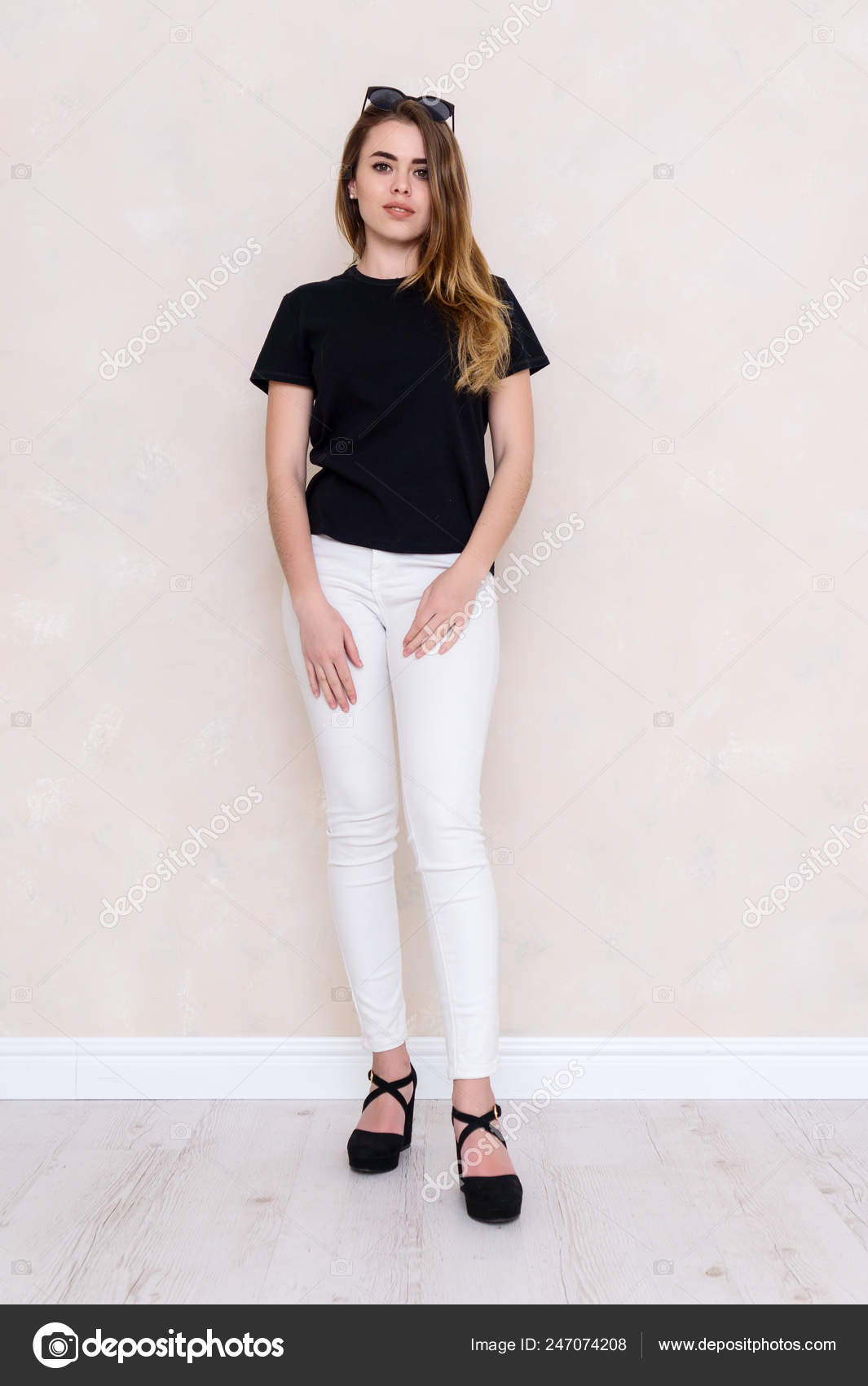 Portrait Girl Studio Beautiful Face Black Shirt White Pants Stock Photo by  ©mobsasha 247074208
