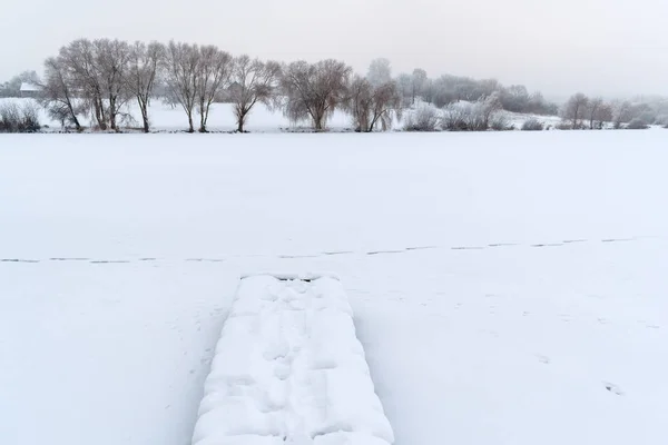 Winter landscape. Winter weather snow is on the ground.