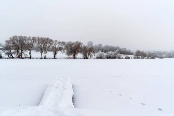 Winter landscape. Winter weather snow is on the ground.