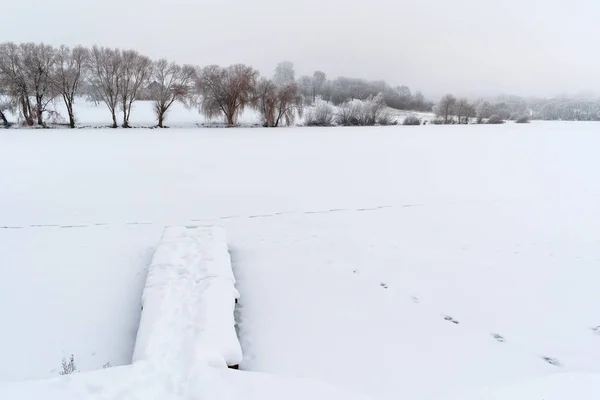 Winter landscape. Winter weather snow is on the ground.