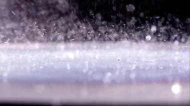 Sıvı sıcak plaka üzerinde zıplayan, makro