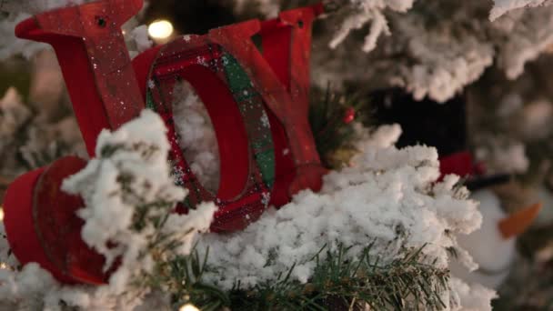 Close View Wooden Joy Sign Flocked Christmas Tree — Stock Video