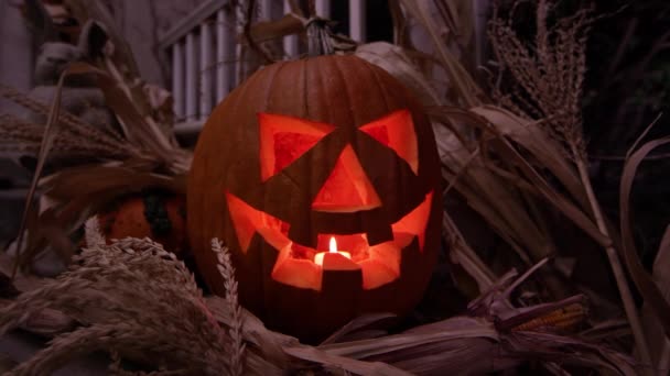 Slowly Rotating Jack Lantern Lit Candle Porch Halloween — Stock Video