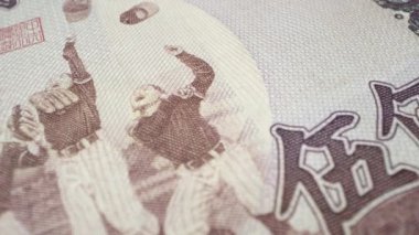 500 üzerinde kaydırma Yeni Tayvan Doları banknot görüntüleme gençlik beyzbol görüntü makro görünümünde.