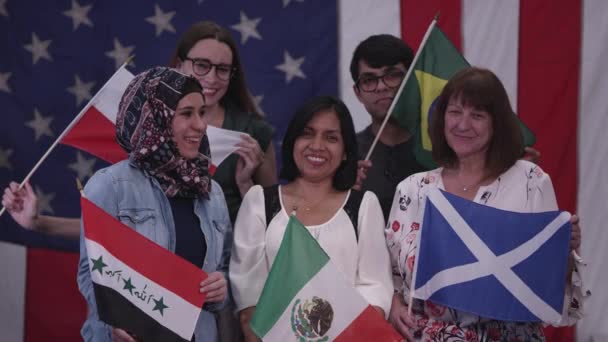 Group People Different Ethnicities Holding Flags Various Countries Have Heritage — Stock Video