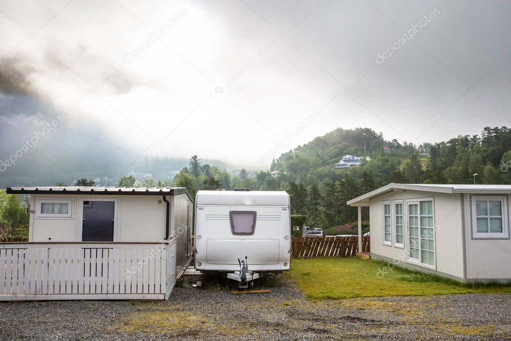 Motorhomes at campsite by the Geirangerfjord in Norway. Concept pictures