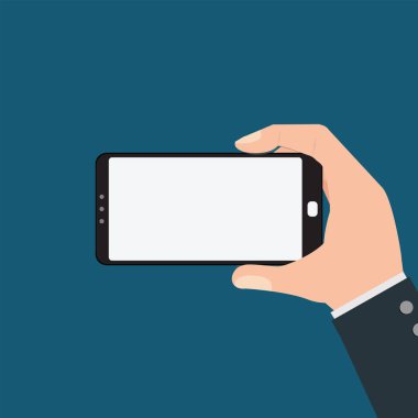Mavi arka planda izole akıllı telefon tutan işadamı. 