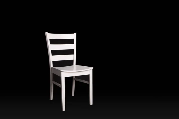 Modern white chair on black background. — Stock Photo, Image