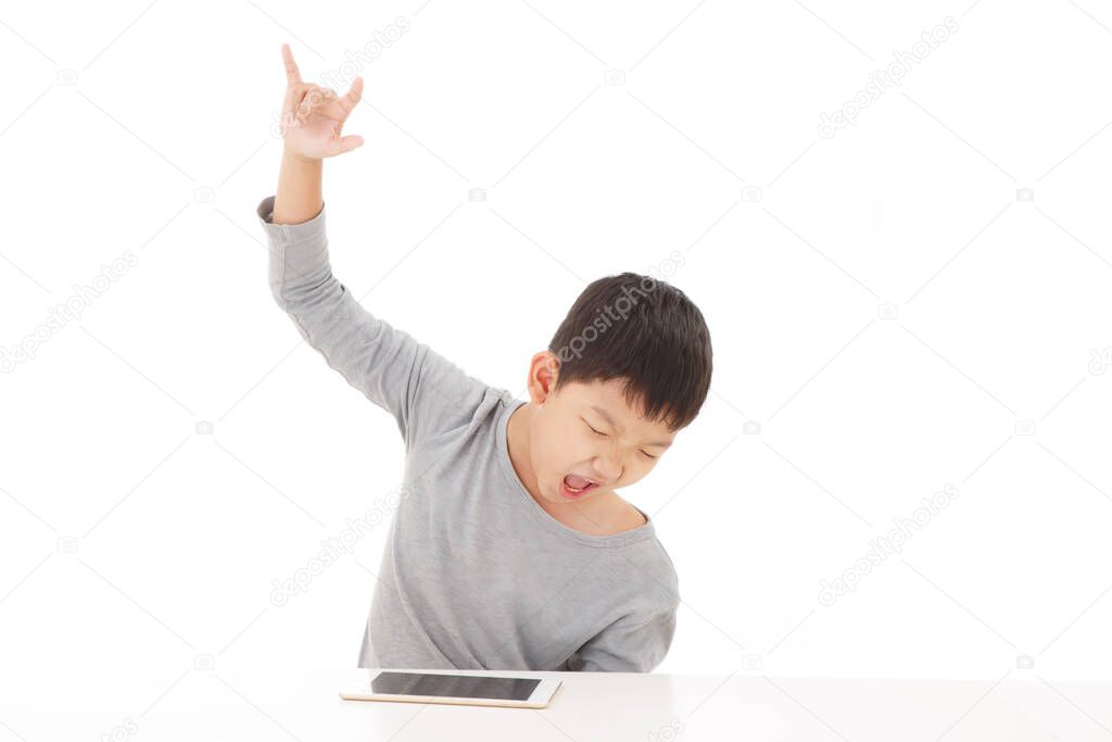 Asian Boy Angry Gamer Isolated on White Background.Victory Pose. Rocker Pose.