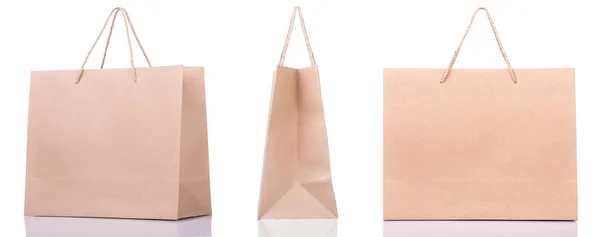 Groep Van Papier Shopping Bags Isolated Witbouw Terug Keer Bekeken — Stockfoto