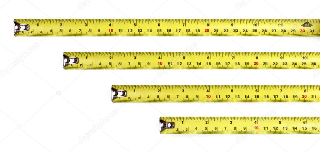 Yellow measuring tape isolated on white background, Top View.  4 in, 6 in, 8 in, 12 in.