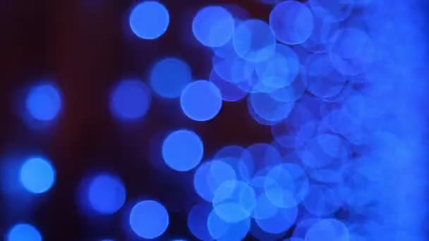 Latar Belakang Hitam Abstrak Dengan Bintik Bintik Biru Yang Berputar — Stok Video