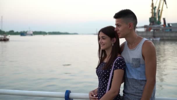 Young Man Embraces His Girlfriend Chats Romantically Quay Sunset Portrait — Stock Video