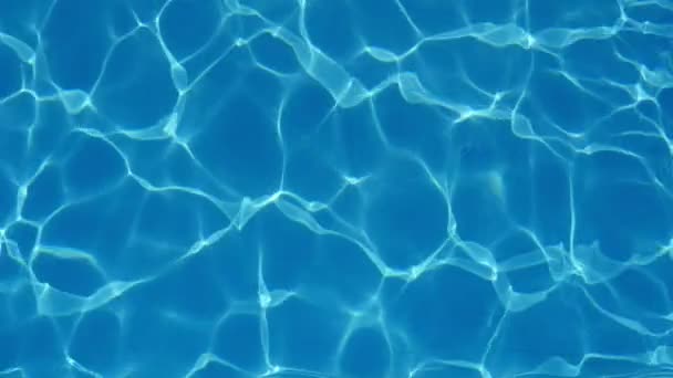 Relaxing Swimming Pool Water Shining Its Swaying Light Blue Waves — Stock Video