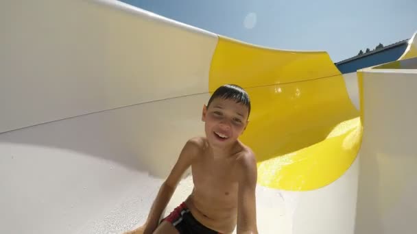 Happy Boy Slides Aqua Park Tube Feeling Cheerfully Summe Slow — Vídeo de Stock