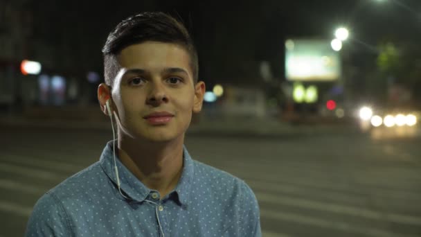 Inspired Man Listening Music Standing Lit Street Night Portrait Optimistic — Stock Video